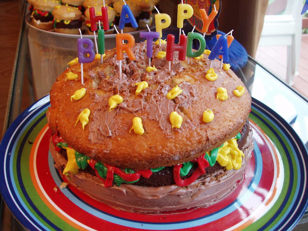 My disasterous attempt at a Burger Birthday Cake, It. helpful non helpful. ...